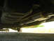 1994 Chevrolet Silverado 3500 - Underside view of a vehicle's fuel tank and exhaust system.