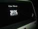 1994 Chevrolet Silverado 3500 - A white truck's rear window displays several stickers, including 'The Shop' and 'REAL MEN LOVE JESUS'.