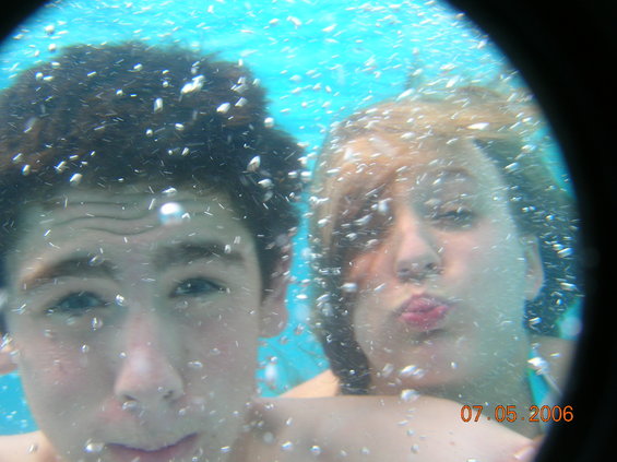 Underwater photo of a young man and woman with bubbles, dated 07.05.2006