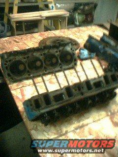 engine block and cylinder head on a workbench