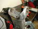 1996 Ford Bronco - A close-up view of a metal suspension part that has undergone welding repairs.