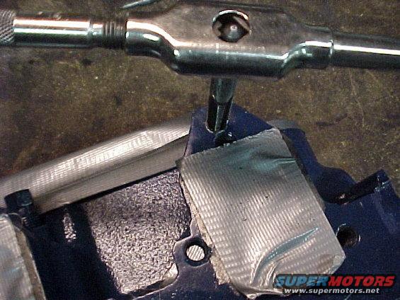 mvc024f.jpg I have Cobra Jet exhaust manifolds on this car which means I have to drill one hole in the driver side head and tap it 3/8" X 16 NC. 