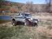 1990 Ford Ranger - This lifted 1990 Ford Ranger is equipped with a snorkel and parked near a body of water.