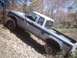 1990 Ford Ranger - A lifted 1990 Ford Ranger navigates a challenging rocky terrain.