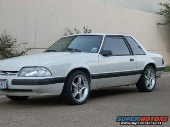 1991 Ford Mustang coupe, white, with aftermarket wheels