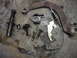 1995 Ford F-250 - Various brake components, including levers and springs, are arranged on a concrete surface, possibly for a Sterling 10.25 axle rebuild.