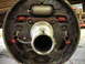 1995 Ford F-250 - This is a close-up view of a vehicle's brake drum assembly, showing the brake shoes, springs, and wheel cylinder.