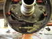 1995 Ford F-250 - Close-up of a vehicle's brake drum assembly, showing internal components and springs.