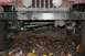 1992 Jeep Cherokee - The front of a vehicle is covered in mud, with leaves and debris obscuring the tires and undercarriage.