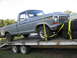 1979 Ford F-150 - Silver 1979 Ford F-150 pickup truck being transported on a flatbed trailer.