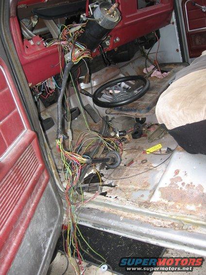 1979 Ford F-150 interior with exposed wiring and steering wheel