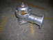 1992 Nissan 240SX - HKS SSQV blow-off valve shown on a concrete surface with yellow markings.