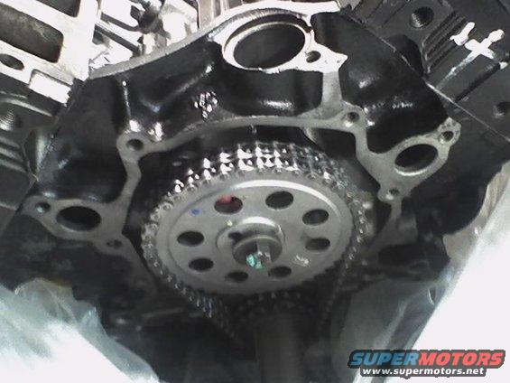 Close-up of engine timing chain and gears