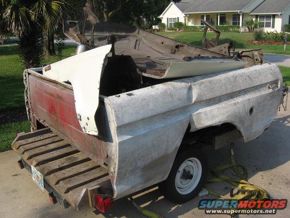 1979 Ford F-150 disassembled truck bed and cab on trailer