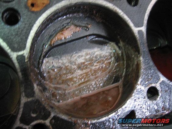Engine cylinder with debris and rust inside