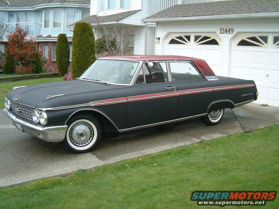 Black 1962 Ford Galaxie 500 with red roof and side trim