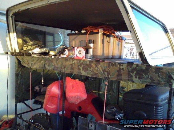1026070724b.jpg killed two birds, moveable storage for top doulbes as an ATV garage.