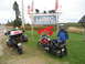 2003 Honda Shadow Aero - A sign welcomes visitors to Lubec, Maine, the easternmost town in the U.S., with two motorcycles parked nearby.