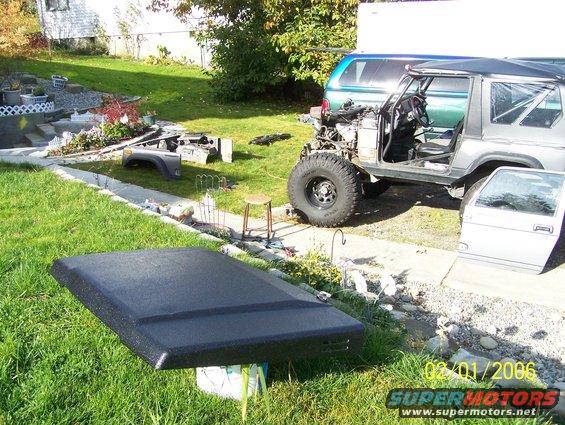 100_3029.jpg side with hood & stock clip