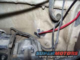 Wiring and tubing through the firewall.  I will be adding gromets after I replace bushings.
