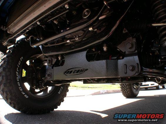 Vehicle underbody with Pro Comp skid plate, BFGoodrich tires, and visible suspension components