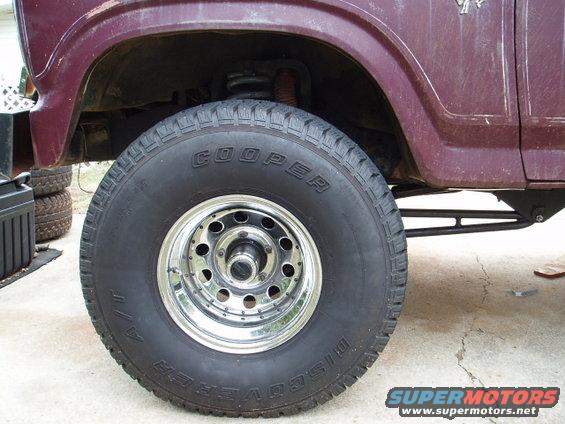 Stock location, 2.75" from inner fender in the rear. Rubbs when turning while flexed. 