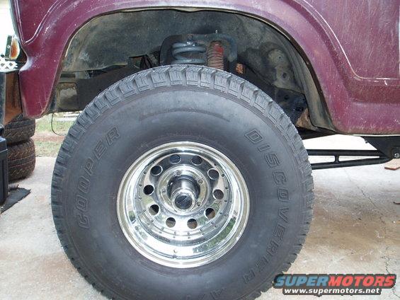 Front axle moved 1.5" forward. Now have 4" between tire and rear inner fender. Also flexed it and no rubbing.