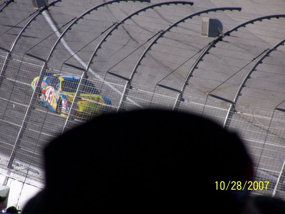 NASCAR race car with number 33 on a track