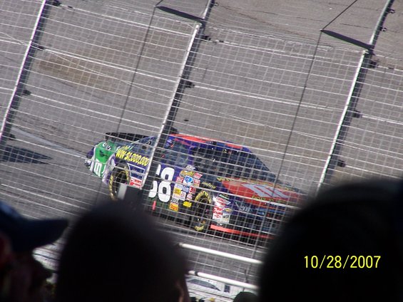 Race car with number 58 and various sponsor decals on a track