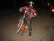 2007 Yamaha R1 - Rider in full gear on a bicycle at night.