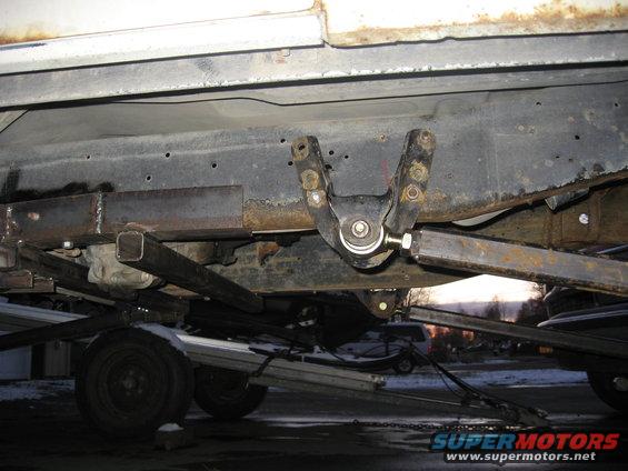 Undercarriage view of custom suspension on a truck frame
