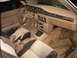 1985 Subaru Brat - Ignore the interior bits on the floor; they're superfluous to operation. That inverted-J-shaped thing below the gear lever is the transfer…