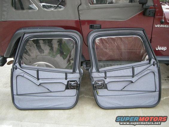 Two soft doors with clear windows removed from a Jeep Wrangler