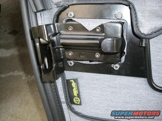 Door latch mechanism with Bestop tag, close-up
