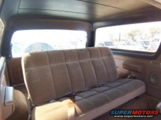 Interior of 1986 Ford Bronco showing rear bench seat and windows