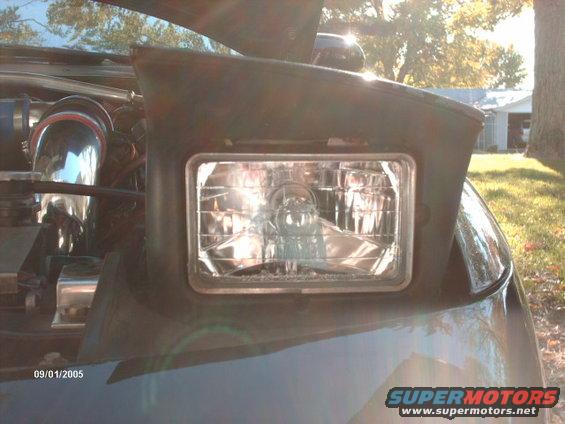 1995 Ford Probe headlight and engine detail