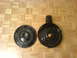 1985 Ford Bronco - Two black air cleaner housings are shown on a wood floor.