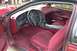 1995 Ford Thunderbird - Interior view of a 1995 Ford Thunderbird, showing the dashboard and seats.
