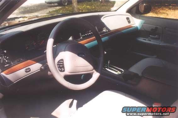 2002 Ford Crown Victoria interior showing dashboard, steering wheel, and center console