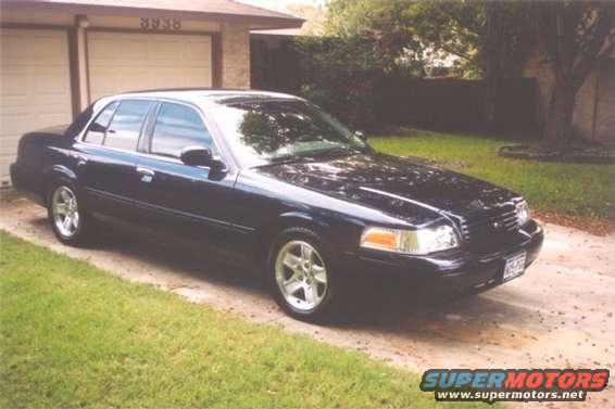 Black 2002 Ford Crown Victoria sedan, 3/4 front view