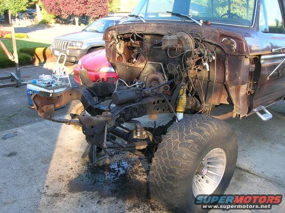 1978 Ford F-250 engine bay with engine removed, brown exterior