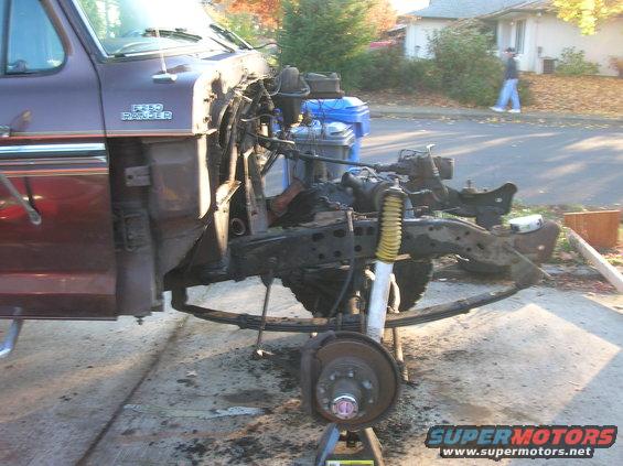 Front end of a 1978 Ford F-250 Ranger with engine removed, showing chassis and suspension