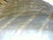 1999 Ford Mustang - Close-up of tire tread detail, showing wear patterns and orange markings.