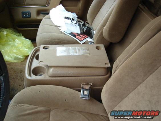 passenger seat, ok. console, no latch. 