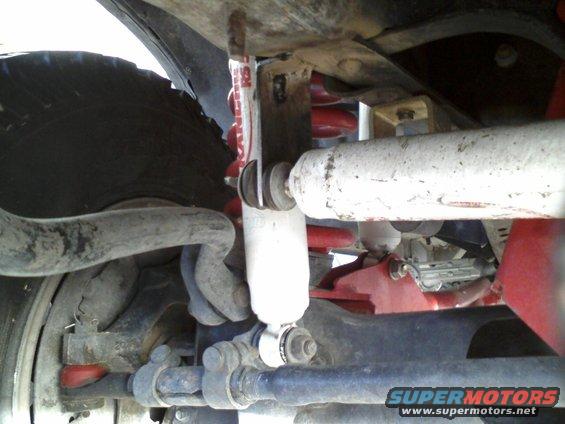 Steering damper and suspension parts on a vehicle