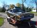 1971 Mercury Cyclone - A customized classic car with flame graphics is being transported on a trailer.