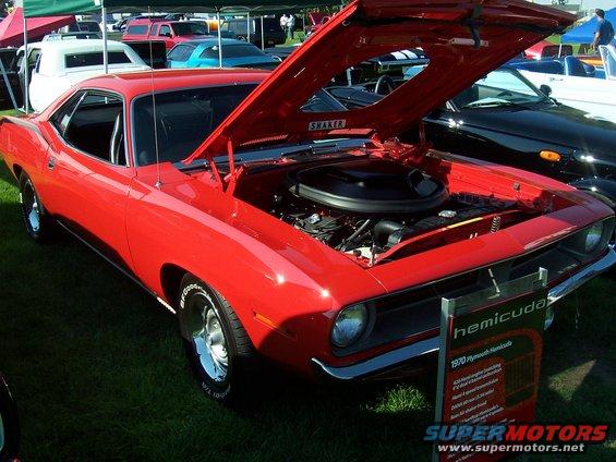 Red 1970 Plymouth Barracuda, 3q-front view, hood open revealing engine