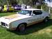 1973 Ford Mustang - This Oldsmobile Cutlass Supreme served as the pace car for the 1972 Indianapolis 500, with other vehicles visible in the background.