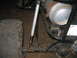 1992 Ford Mustang - Close-up of off-road vehicle suspension components and a large auxiliary fuel tank.