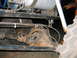 1992 Ford Mustang - The rear axle and suspension of a modified off-road vehicle are shown in this close-up view.